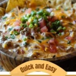 Delicious cheesy bean dip served in a bowl with tortilla chips