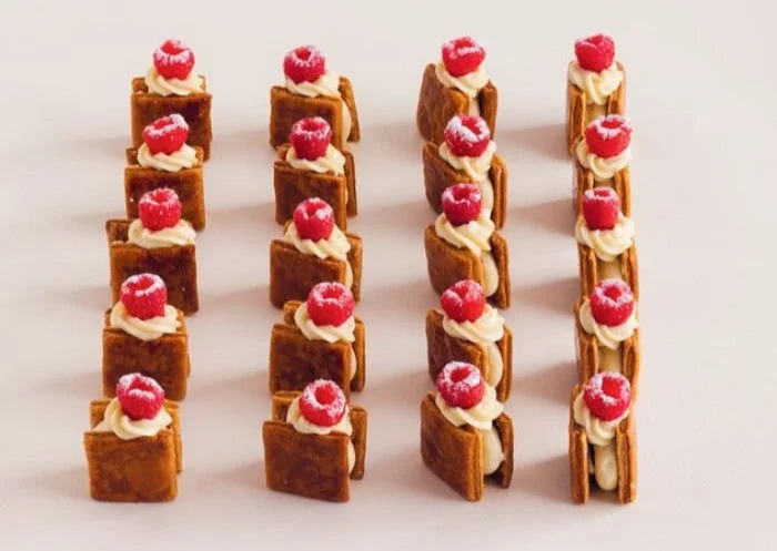 Delicious Raspberry Napoleon dessert with layers of pastry and fresh raspberries