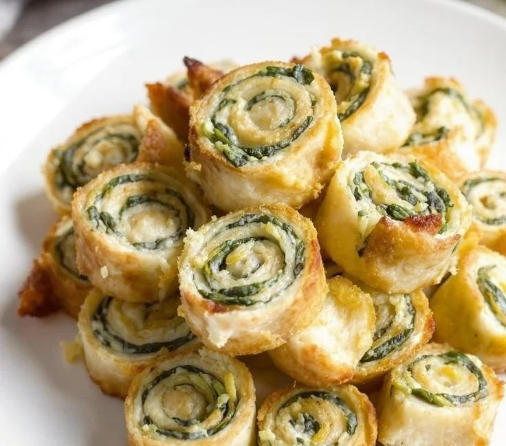 Spinach Dip Pinwheels served as a delicious appetizer