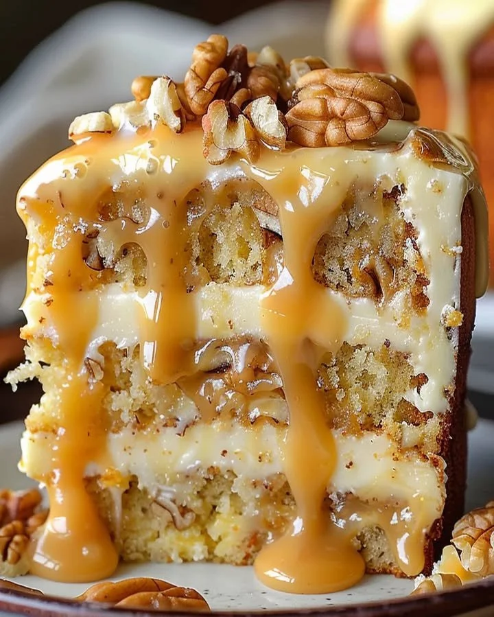 Delicious Caramel Pecan Layer Cake with caramel drizzle and pecan toppings