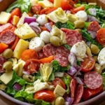Delicious Italian Chopped Salad with colorful vegetables and dressing