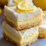 Refreshing lemon cream bars topped with lemon zest and whipped cream