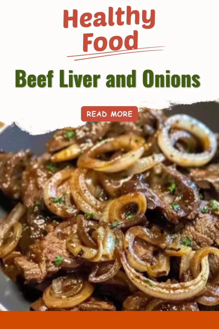 Juicy beef liver cooked with onions, served on a plate.