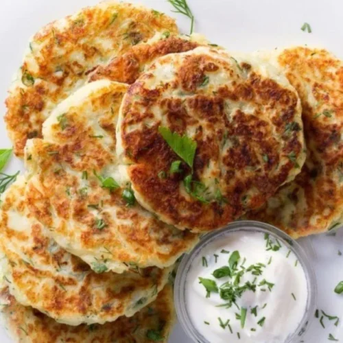 Delicious blueberry chia seed pudding in a glass bowl topped with fresh blueberries.