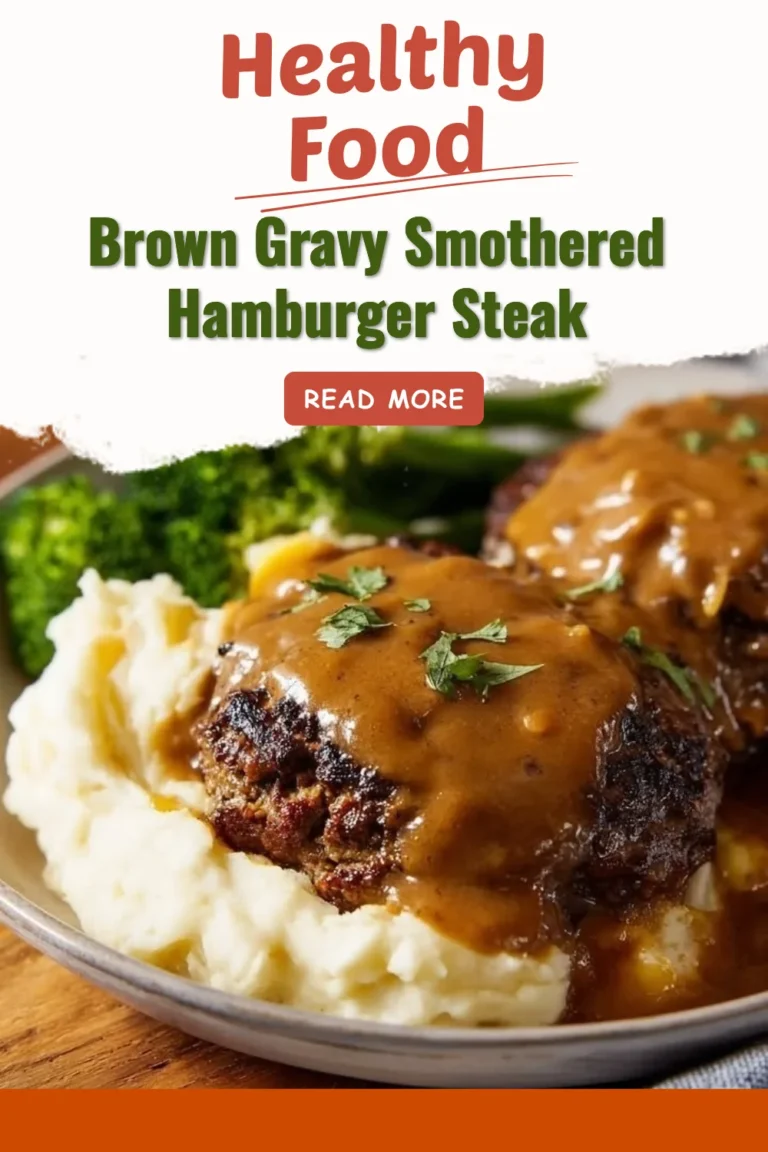Delicious brown gravy smothered hamburger steak served with sides