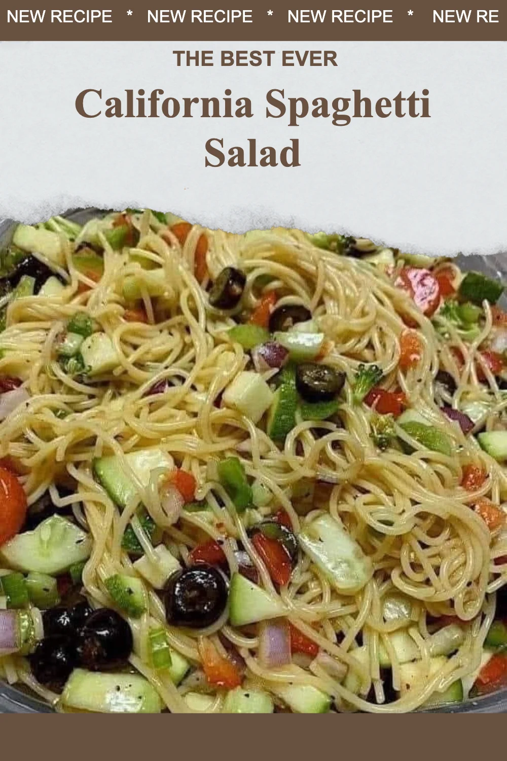 Bowl of colorful California Spaghetti Salad with vegetables and dressing