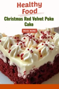 Christmas Red Velvet Poke Cake with cream topping on a festive table