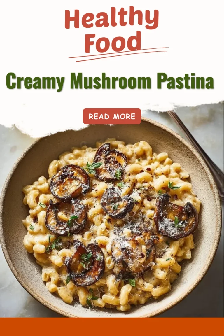 A delicious bowl of creamy mushroom pastina garnished with fresh herbs.