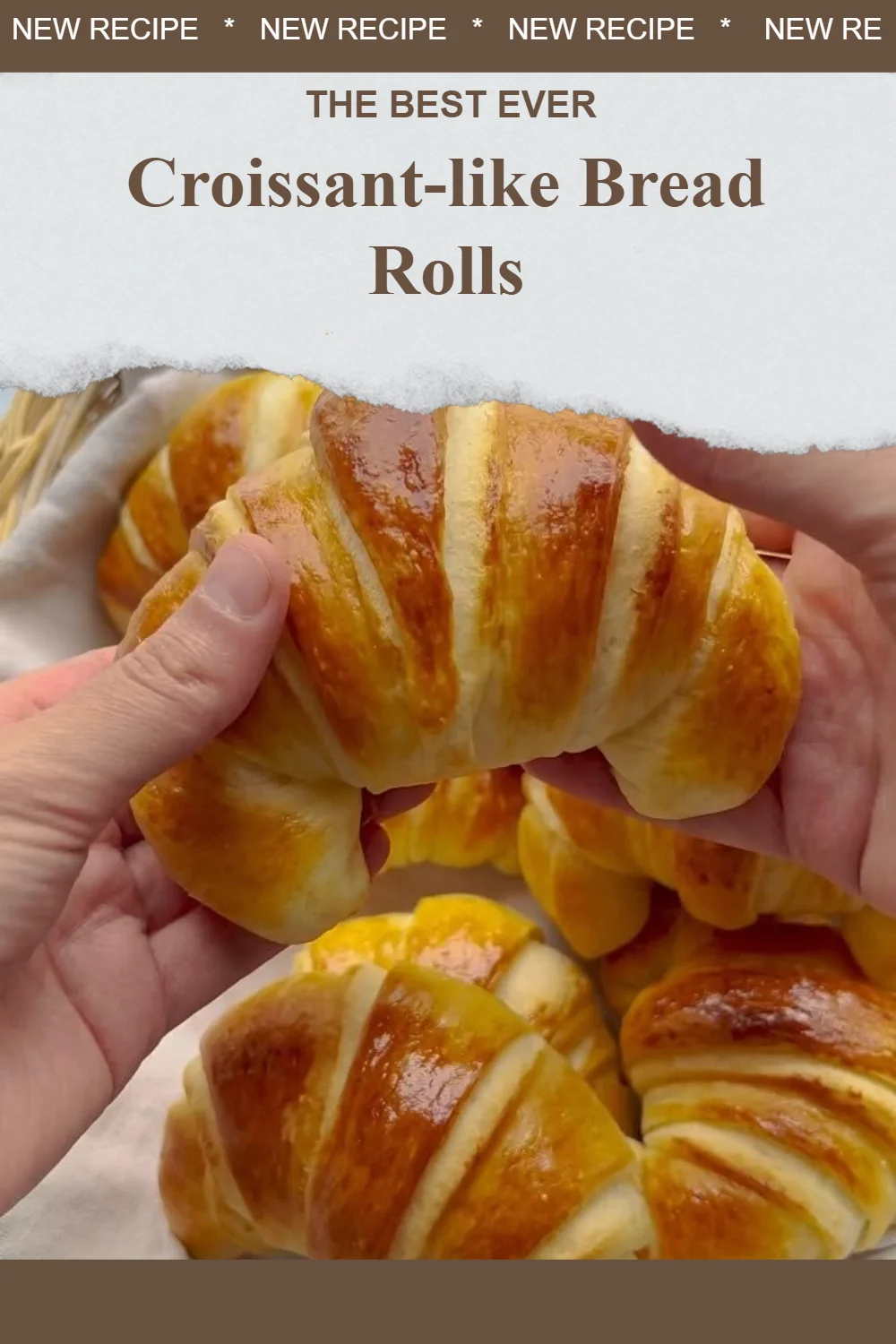 Croissant-like bread rolls fresh out of the oven, flaky and golden brown.