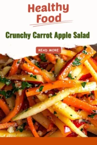 Crunchy carrot apple salad with fresh ingredients served in a bowl