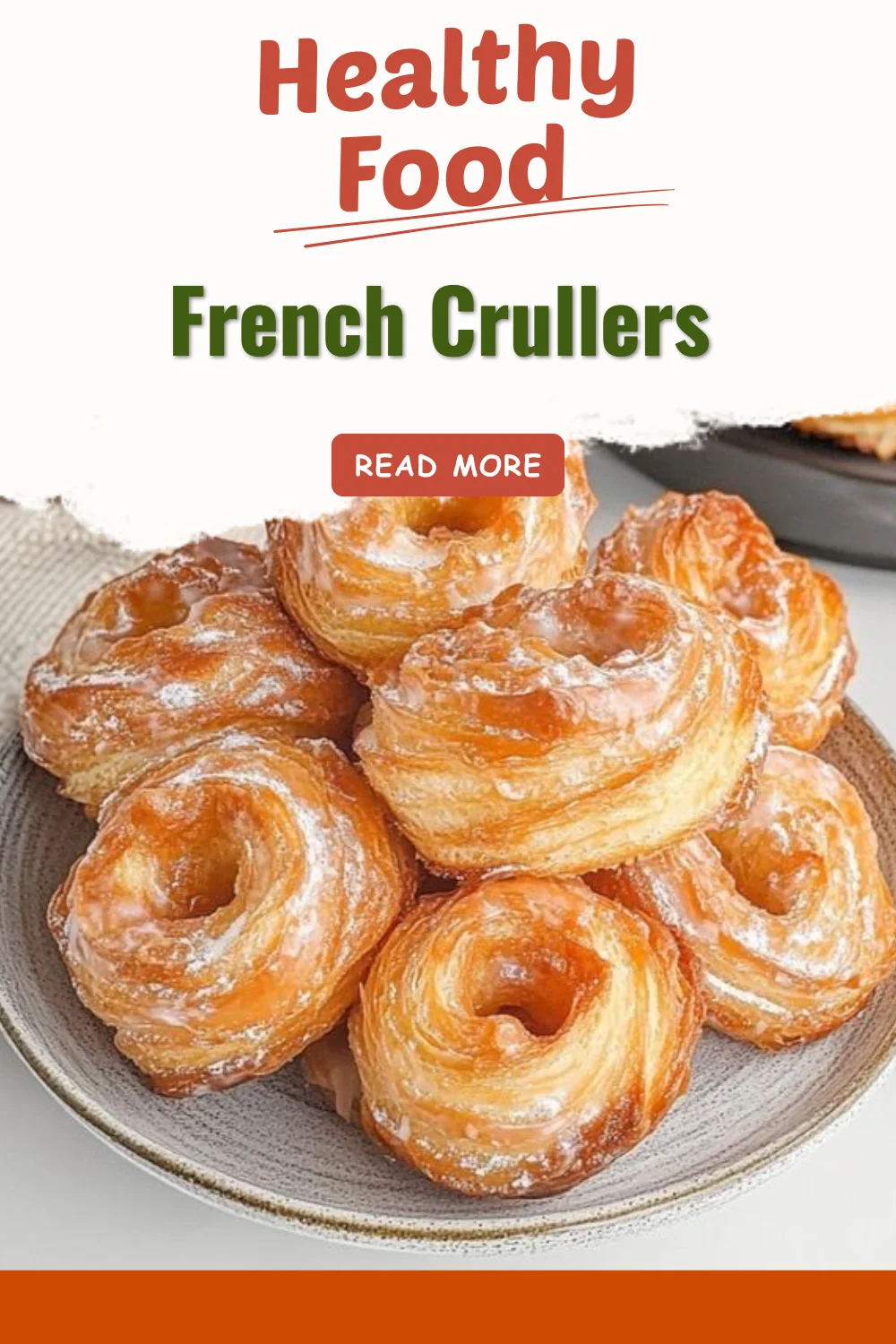 Freshly made French Crullers dusted with powdered sugar