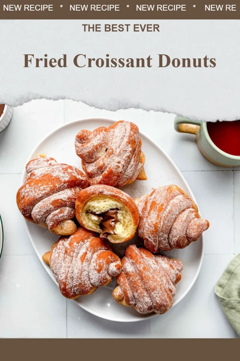 Fried croissant donuts garnished with icing and sprinkles