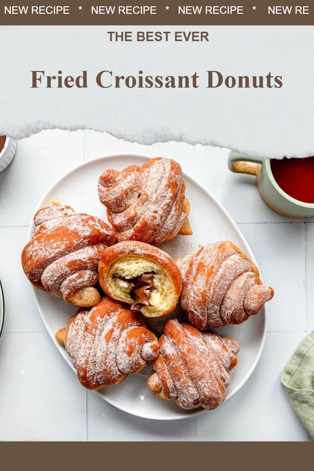 Fried croissant donuts garnished with icing and sprinkles