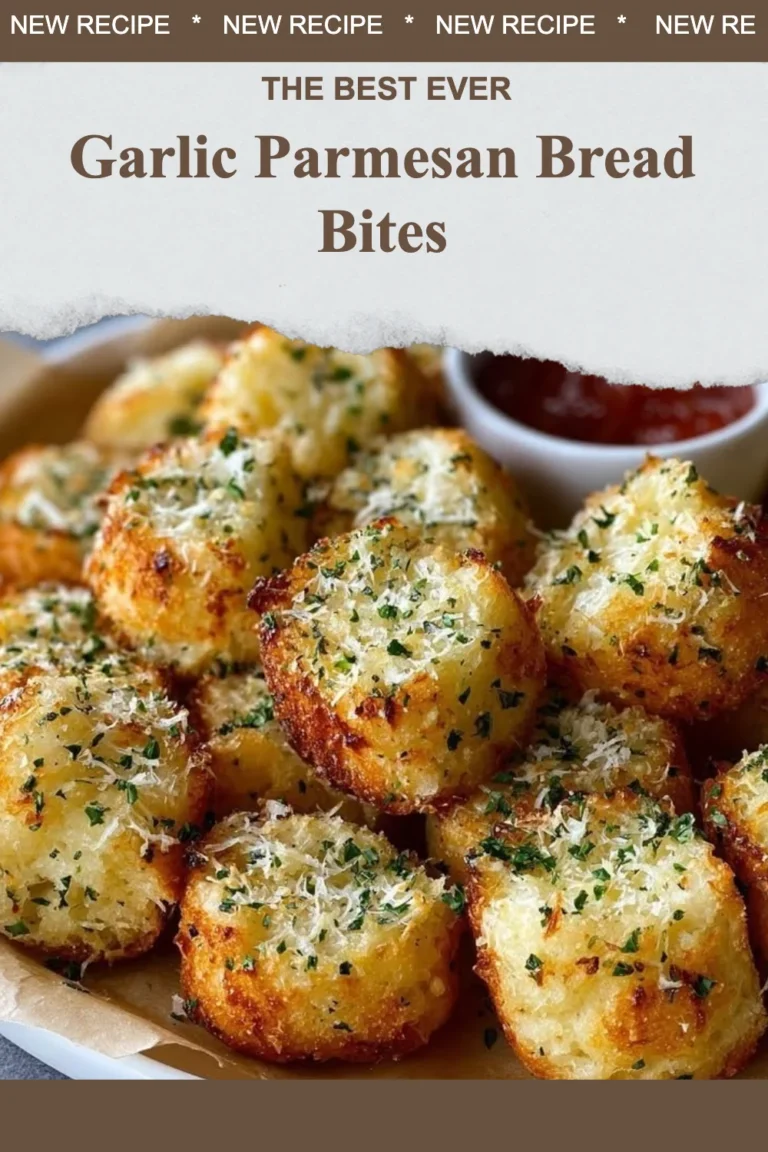 Plate of freshly baked Garlic Parmesan Bread Bites with herbs and cheese.