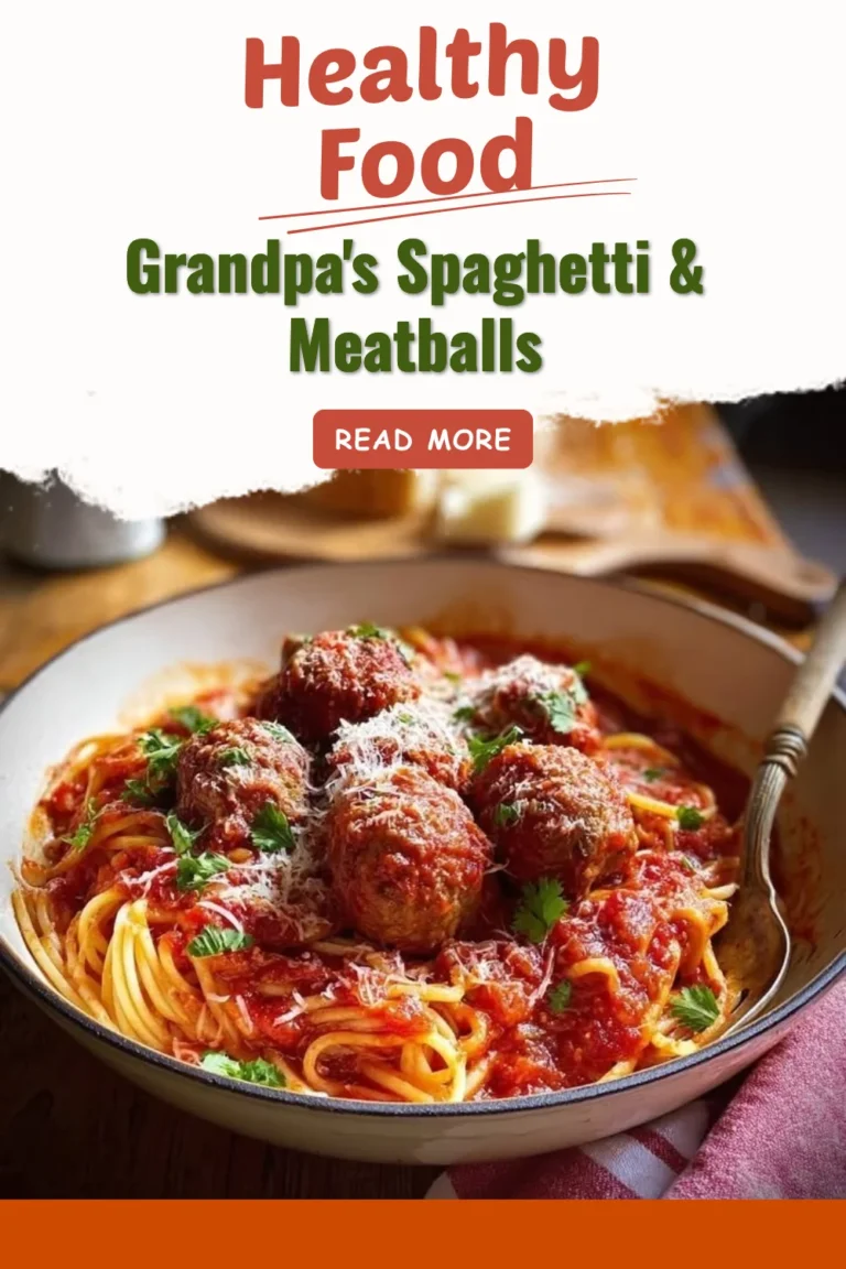 Plate of Grandpa's homemade spaghetti and meatballs with fresh herbs