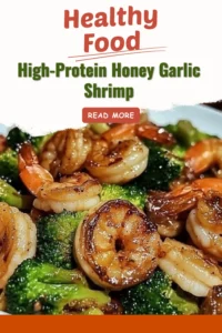 High-protein honey garlic shrimp dish served on a plate with vegetables