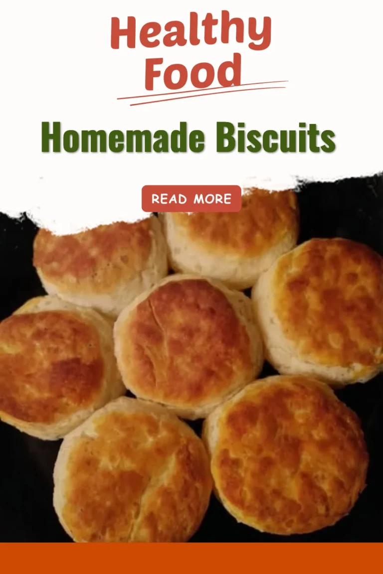 Fluffy homemade biscuits served on a wooden table
