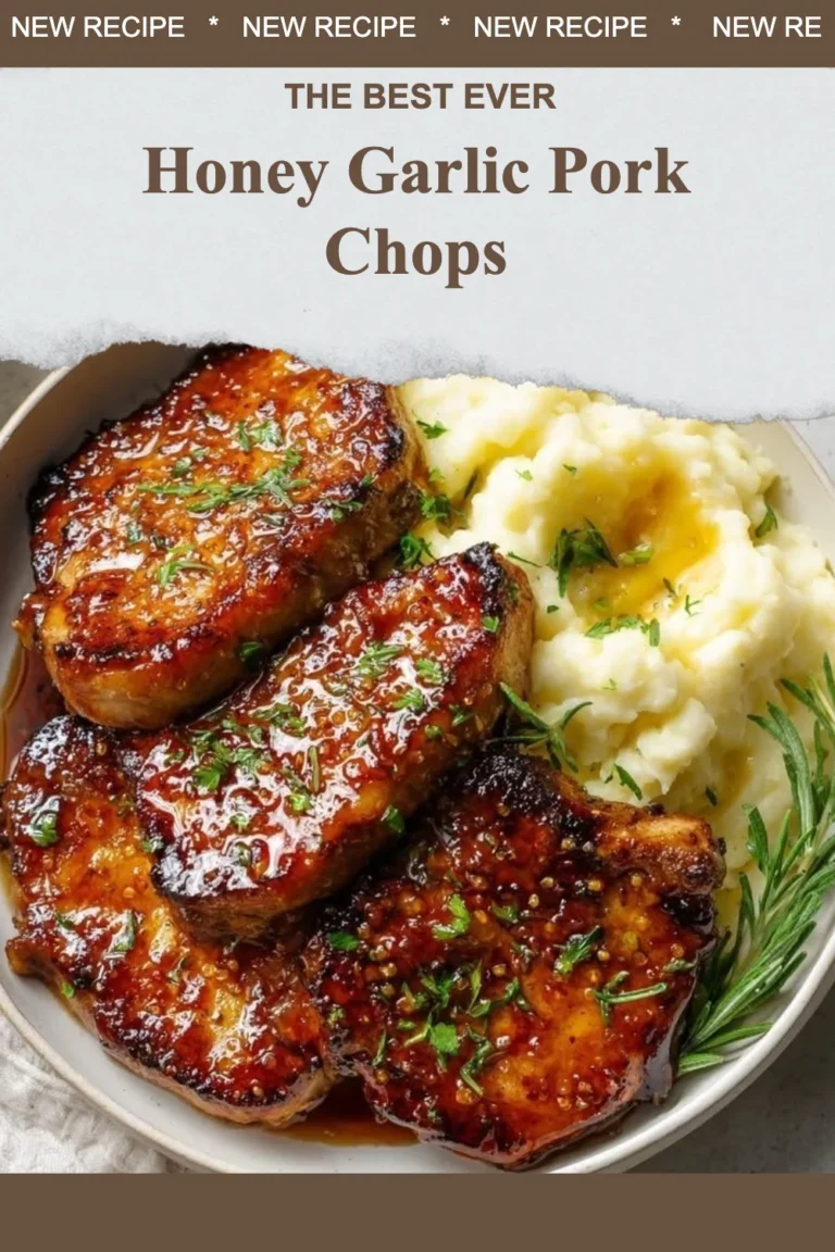 Honey Garlic Pork Chops served with roasted vegetables on a plate.