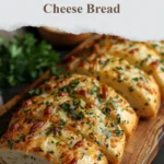 Freshly baked Italian Herbs and Cheese Bread with herbs and cheese toppings