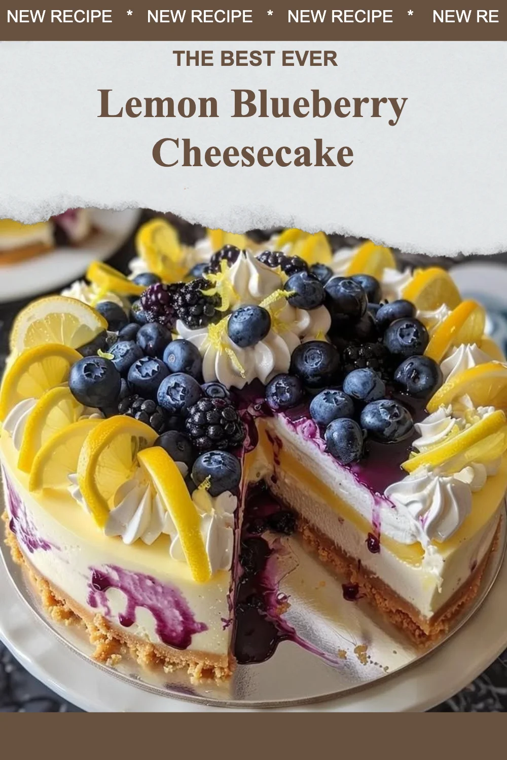Slice of Lemon Blueberry Cheesecake topped with fresh blueberries and lemon zest
