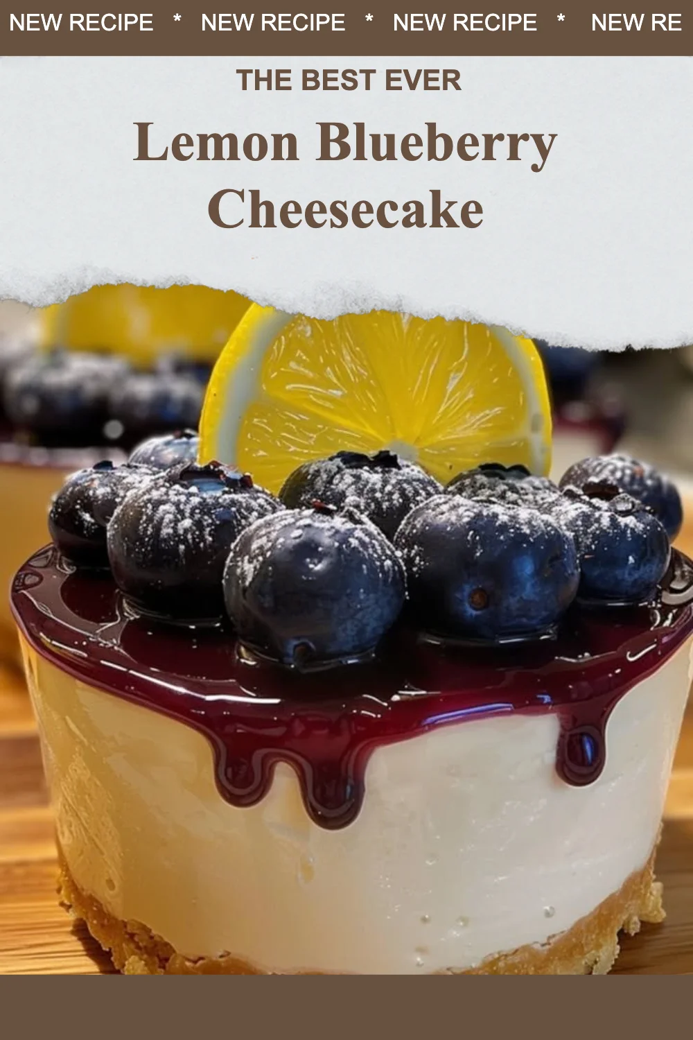 Slice of lemon blueberry cheesecake garnished with blueberries and lemon zest