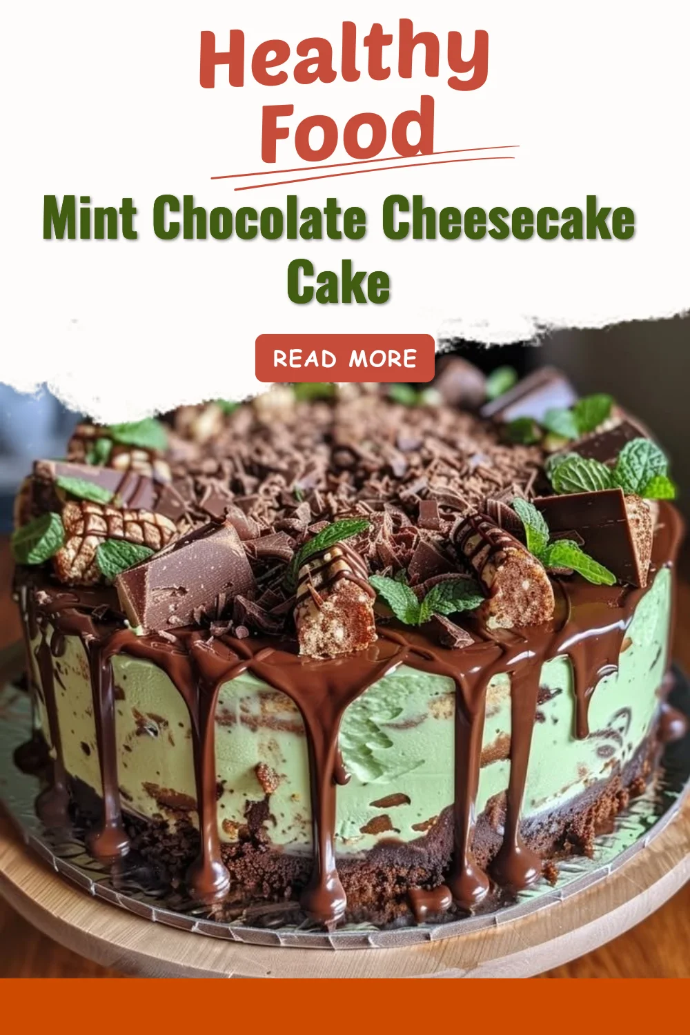 Mint chocolate cheesecake cake topped with chocolate shavings and mint leaves