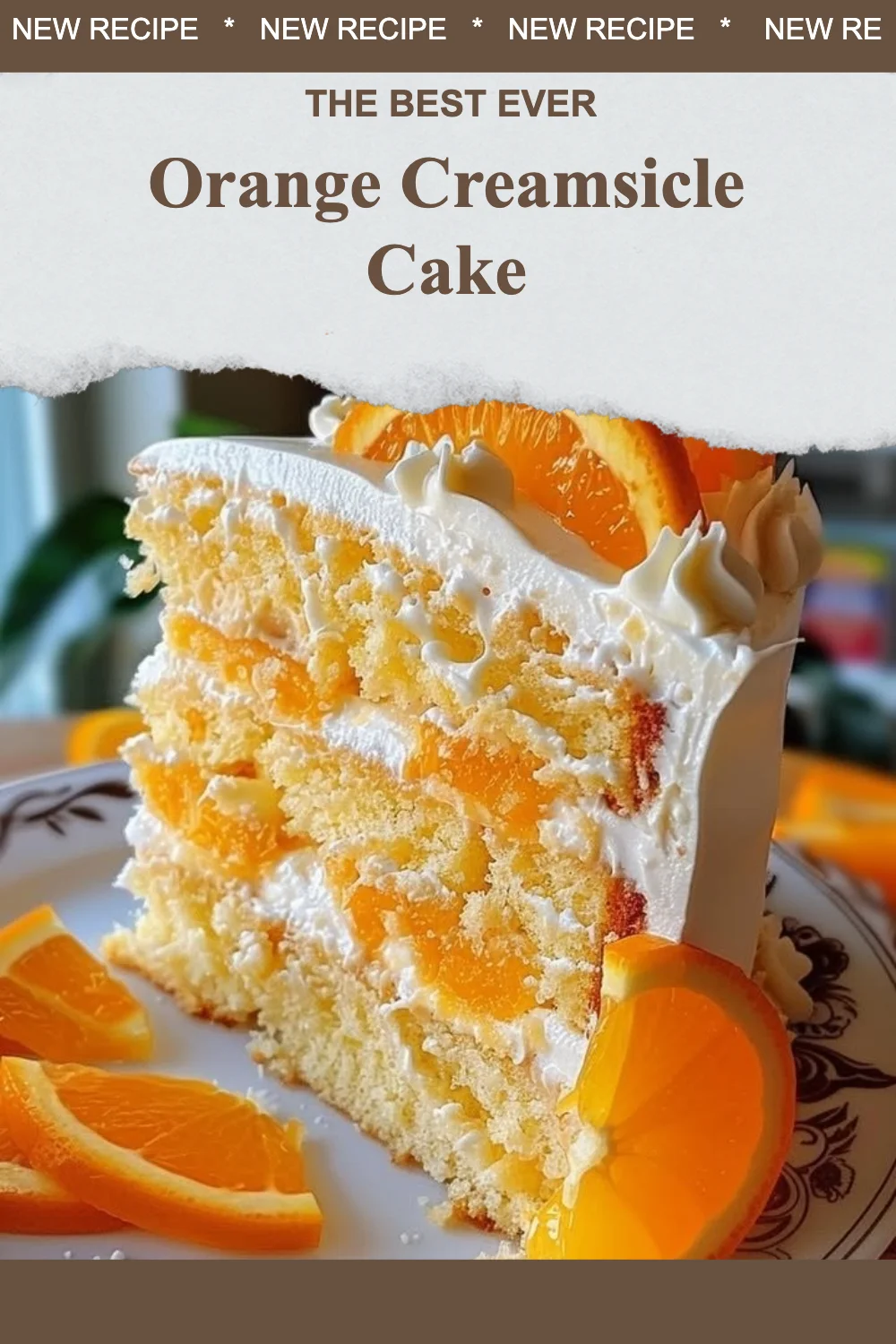 Delicious Orange Creamsicle Cake topped with orange frosting and cream