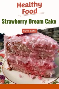 Beautiful Strawberry Dream Cake with fresh strawberries and whipped cream frosting