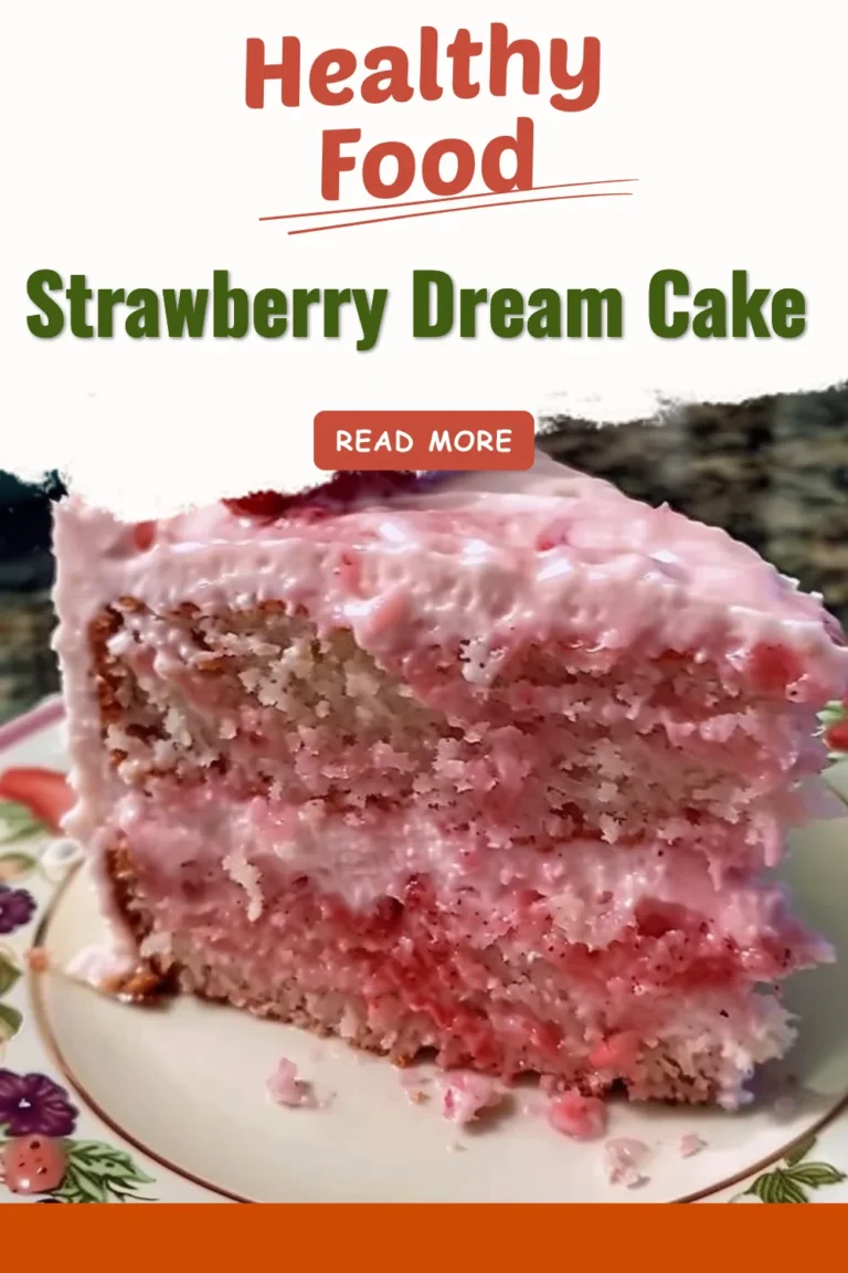 Beautiful Strawberry Dream Cake with fresh strawberries and whipped cream frosting