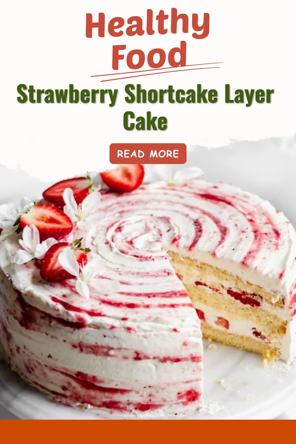 Strawberry shortcake layer cake with fresh strawberries and whipped cream