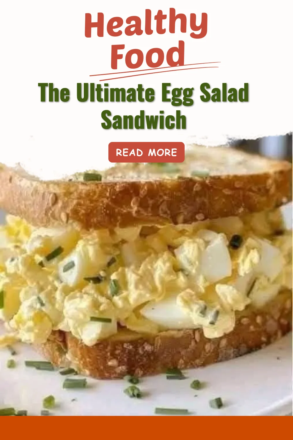 Delicious ultimate egg salad sandwich on a plate with fresh greens