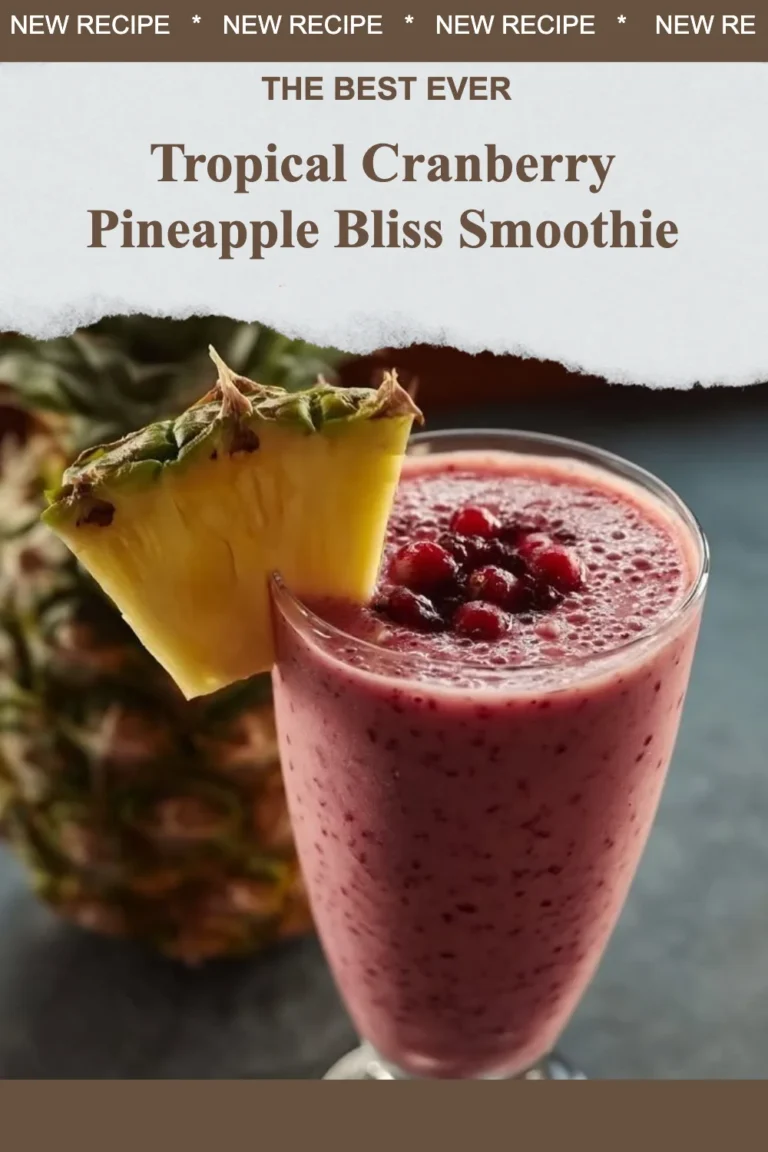 Tropical cranberry pineapple smoothie in a glass with fresh fruits.