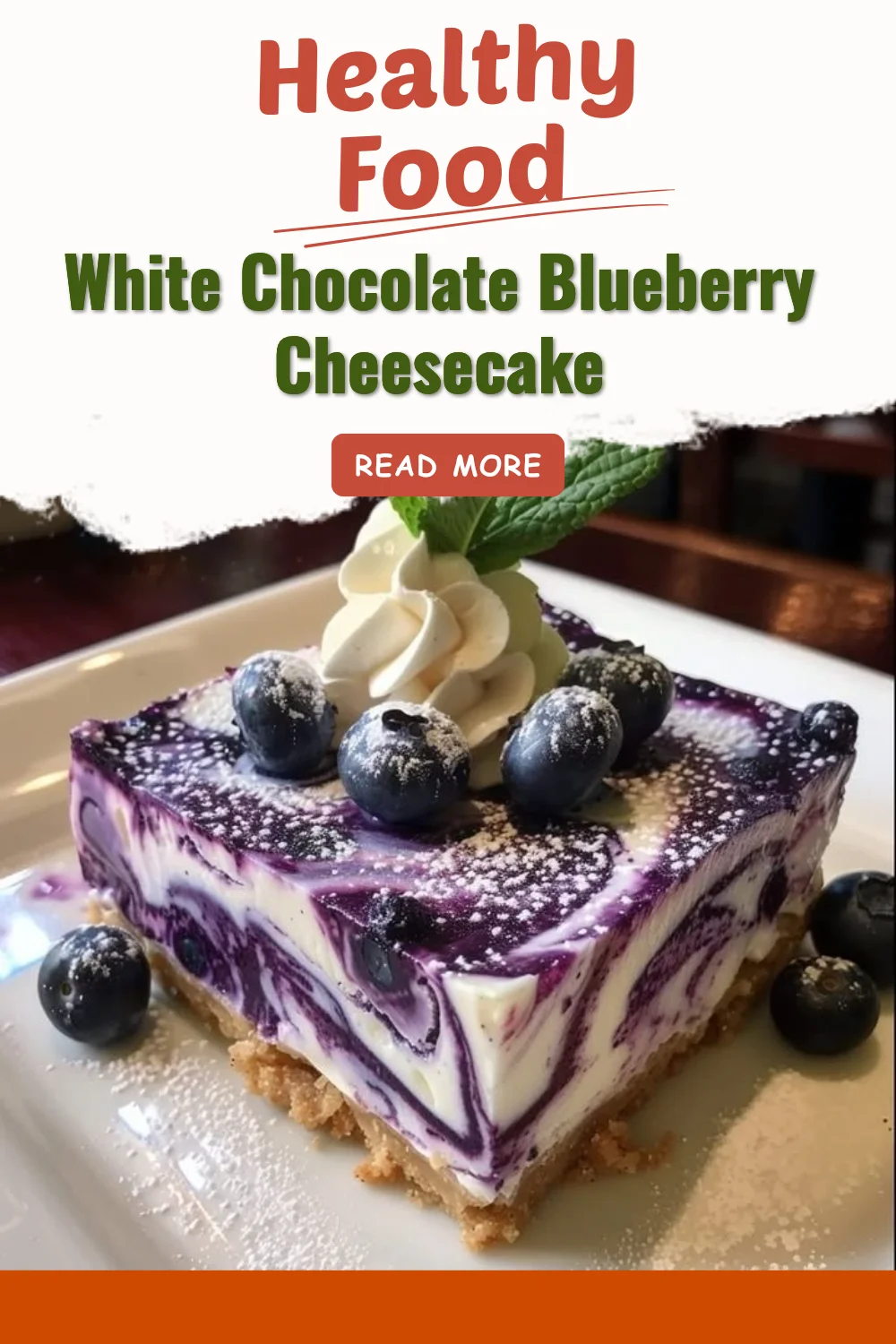 Delicious white chocolate blueberry cheesecake topped with fresh blueberries.