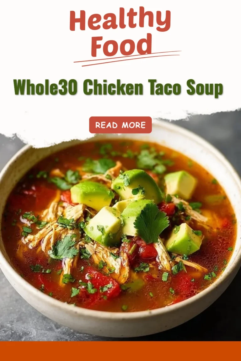 Bowl of Whole30 Chicken Taco Soup with fresh ingredients and spices