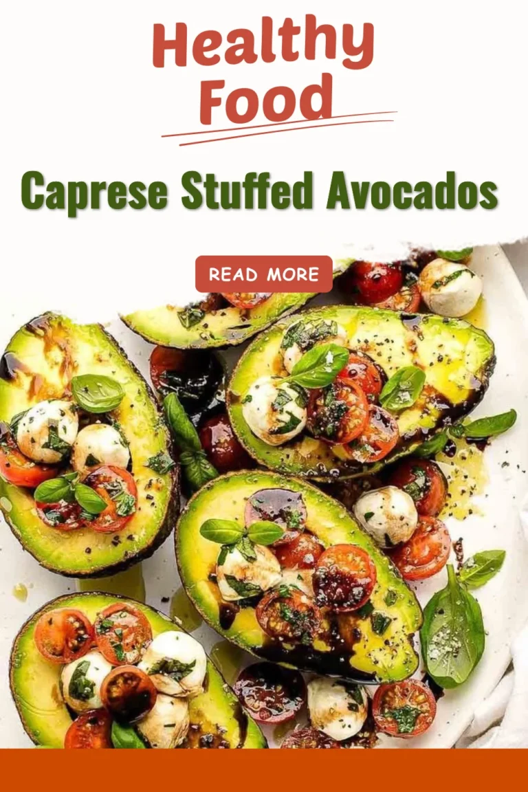 Caprese stuffed avocados with tomatoes, mozzarella, and basil
