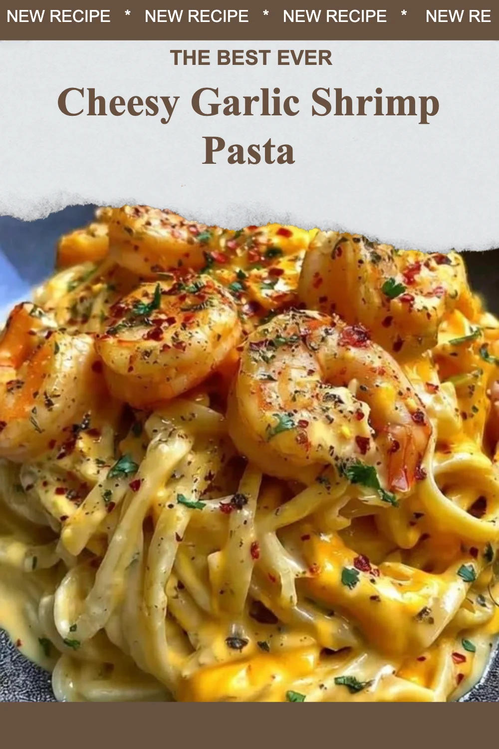 Creamy cheesy garlic shrimp pasta garnished with fresh parsley