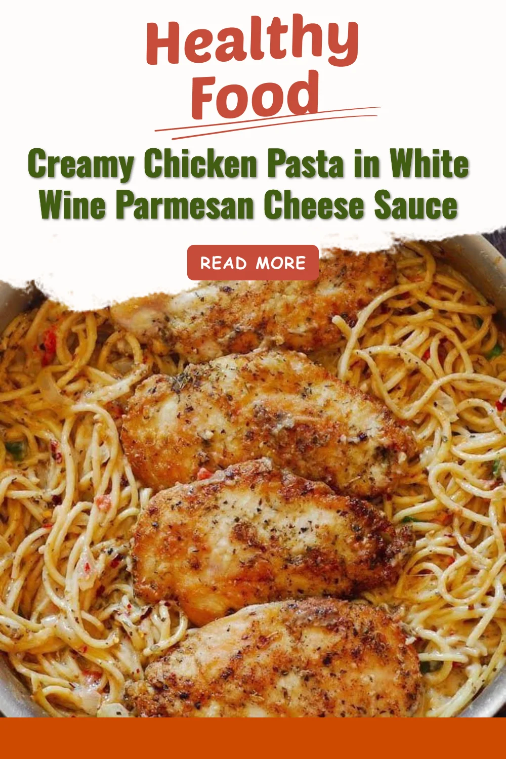 Plate of creamy chicken pasta in white wine parmesan cheese sauce