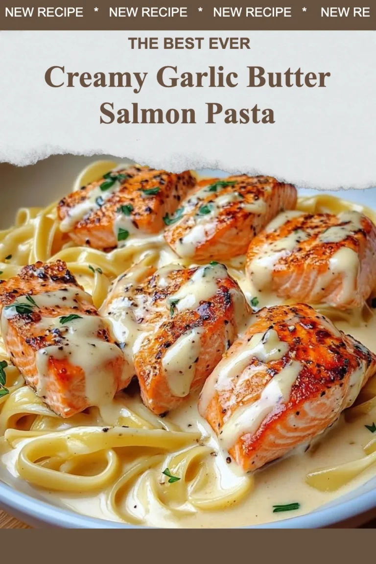 Creamy garlic butter salmon pasta with herbs and lemon zest