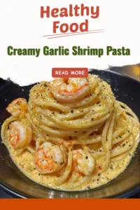Creamy garlic shrimp pasta with herbs and spices