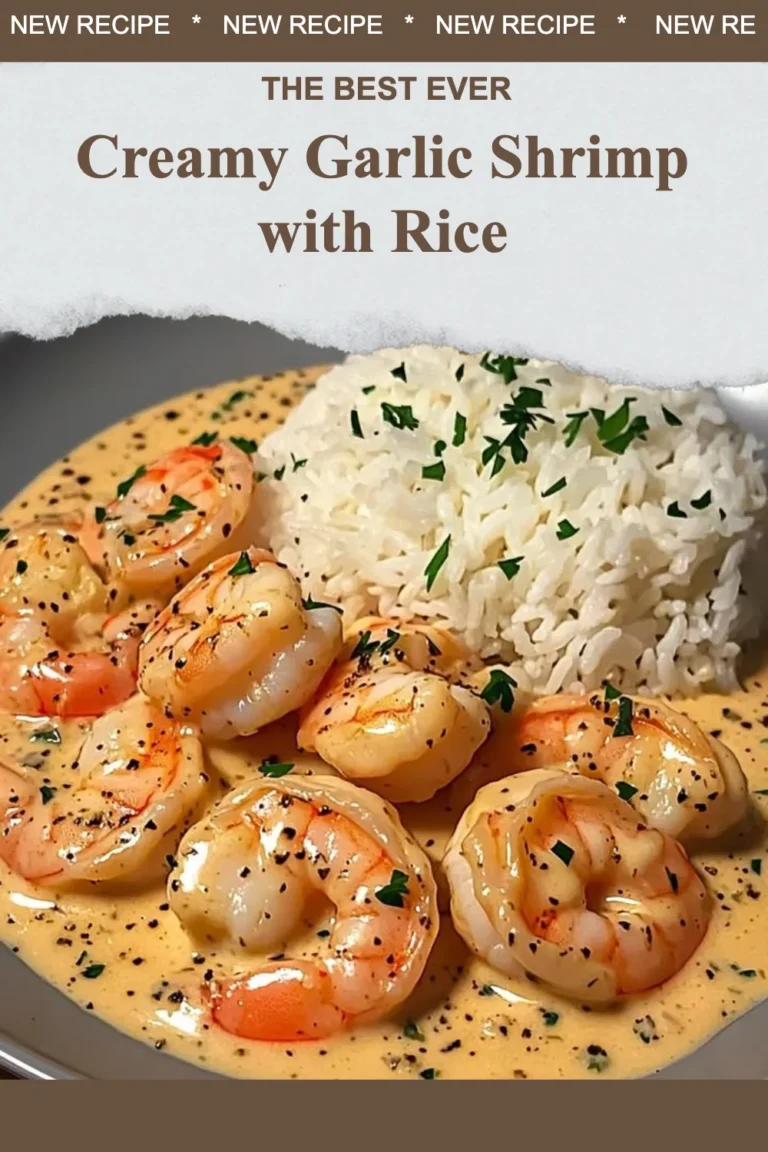Plate of creamy garlic shrimp served with rice on a wooden table.