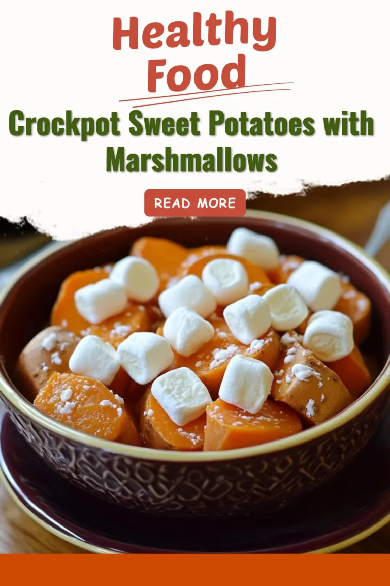 Crockpot sweet potatoes topped with marshmallows in a delicious dish.