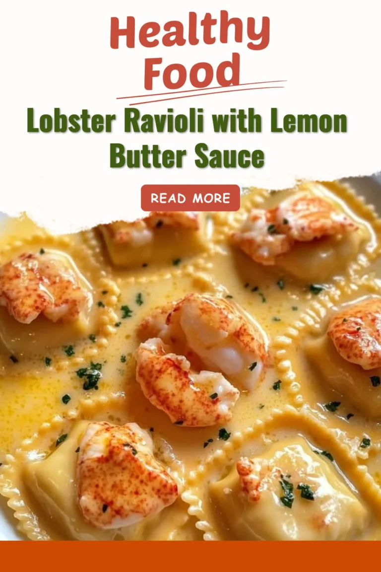 Plate of lobster ravioli drizzled with lemon butter sauce, garnished with herbs.