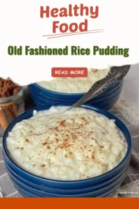 A creamy bowl of old fashioned rice pudding topped with a sprinkle of cinnamon.