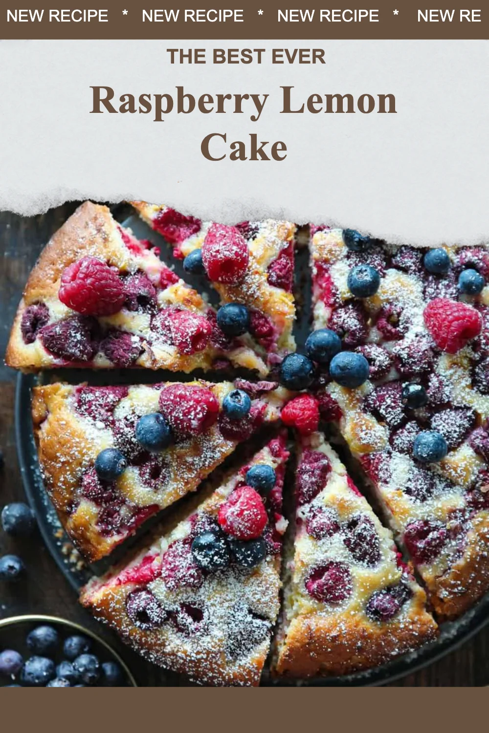 Slice of Raspberry Lemon Cake with fresh raspberries and lemon zest on top