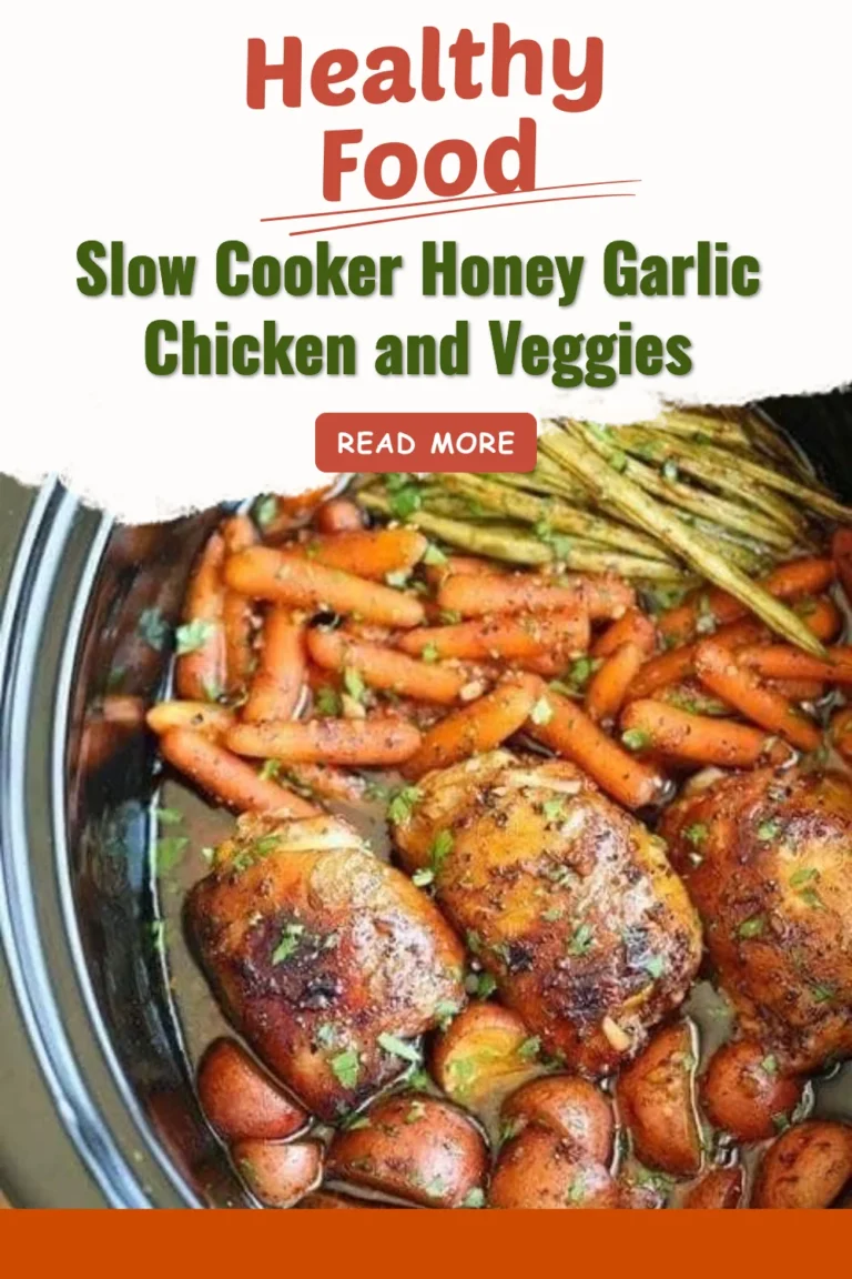 Slow Cooker Honey Garlic Chicken with colorful veggies ready to serve.