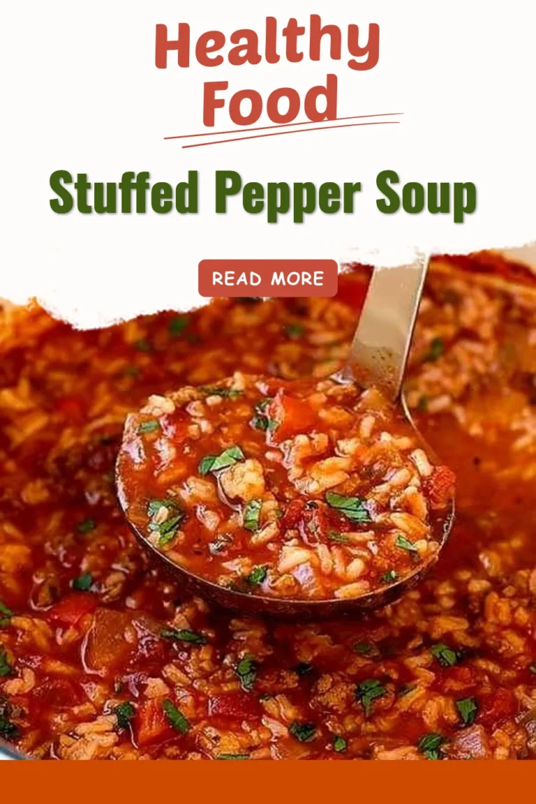 Bowl of hearty stuffed pepper soup topped with herbs and spices.