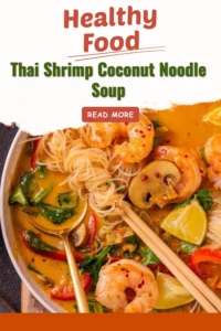 Delicious Thai Shrimp Coconut Noodle Soup garnished with herbs and spices.