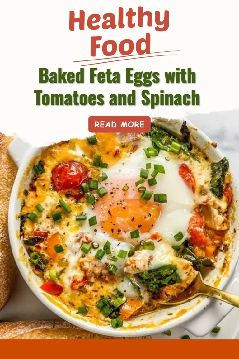 Baked feta eggs with tomatoes and spinach served in a dish
