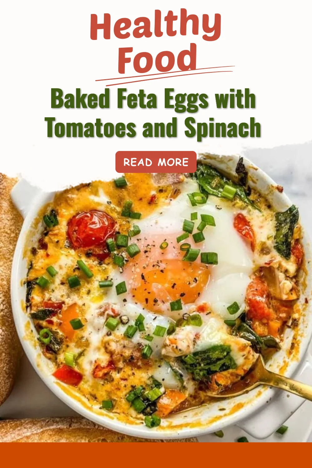 Baked feta eggs with tomatoes and spinach served in a dish