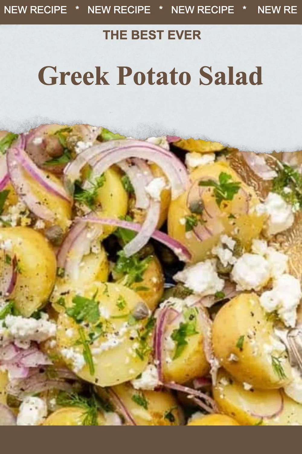 Bowl of Greek Potato Salad with olives, feta cheese, and fresh herbs